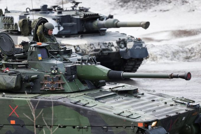 NATO, in Arctic training drills, faces up to Putin's 'unpredictable' Russia.