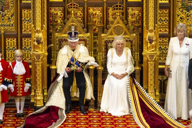 King Charles III reads the King's Speech from the throne in the House of Lords during the State Opening of Parliament