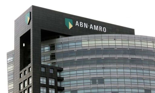 ABN AMRO bank building exterior with European Central Bank and Dutch flags flying nearby