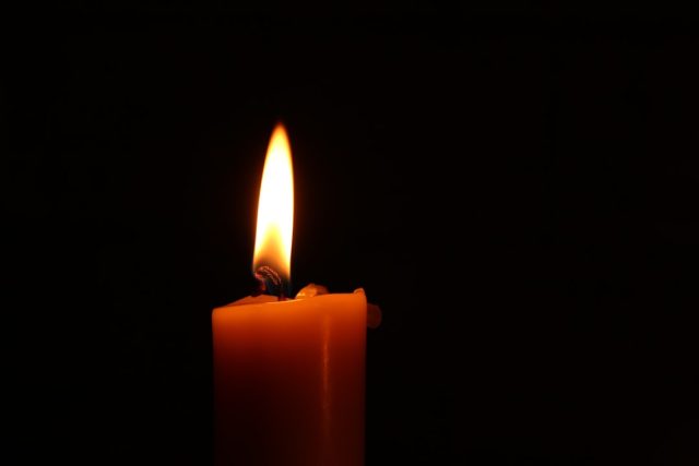 A list of names on an obituary page with cancer highlighted as a recurring cause of death.