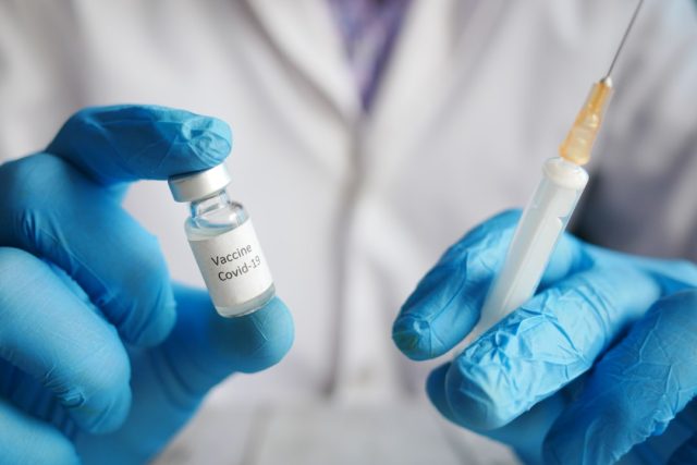 US Military Discredited China’s CoronaVac Vaccine in Philippines, Reuters Reports A syringe and vial labeled CoronaVac sit on a table, representing the vaccine targeted by a US military disinformation effort.