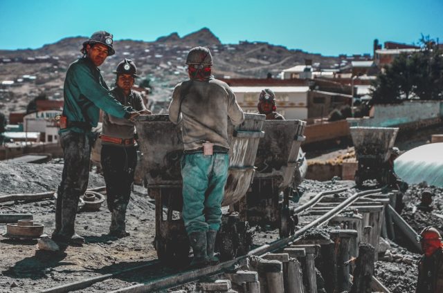 Rescue crews gather near the entrance of the KDC gold mine in South Africa after a collapse trapped 260 miners underground.