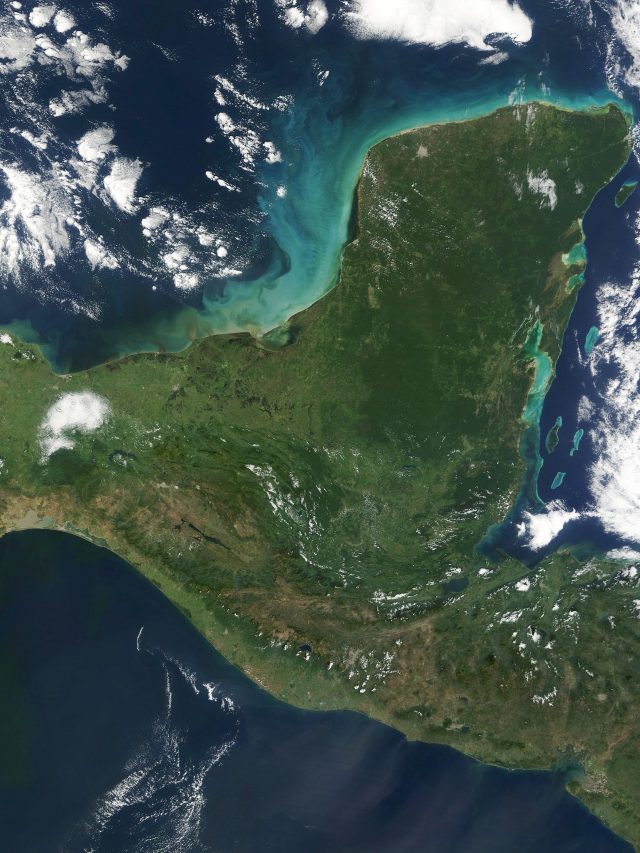 Satellite image of Hurricane Beryl approaching the Yucatán Peninsula with spiral bands of clouds over the Gulf of Mexico