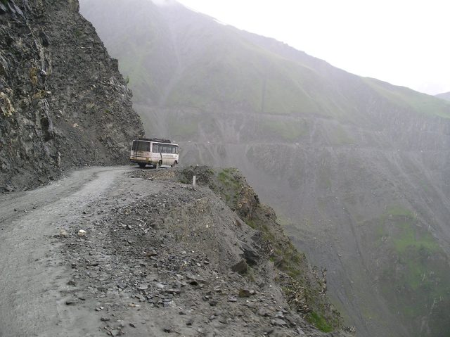 Rescuers search through debris at the Zoji La pass in Ladakh after a deadly landslide struck the Himalayan highway.