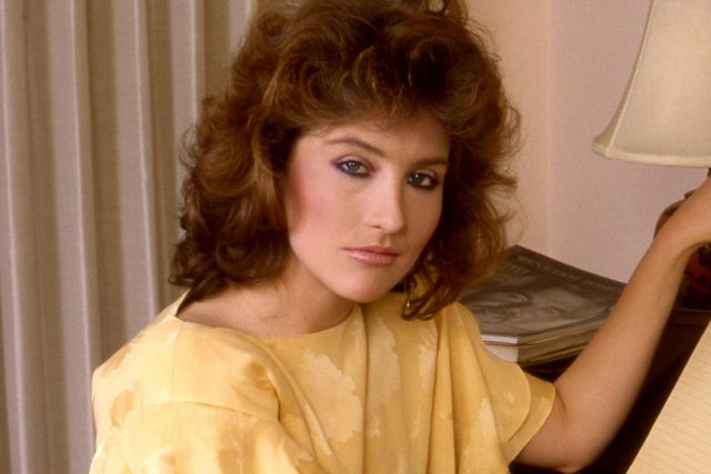 A portrait of actress Robyn Bernard smiling in a professional headshot