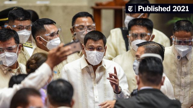 President Duterte signs the March 2020 proclamation as officials stand by, Manila
