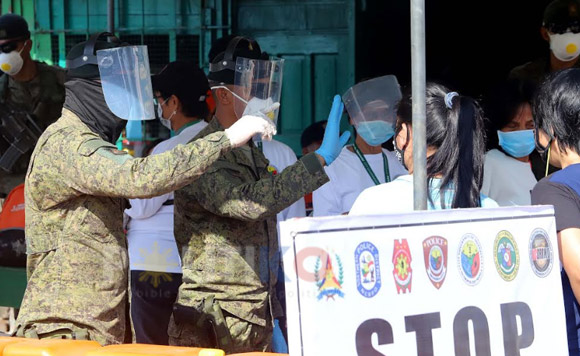 Rodrigo Duterte Luzon Quarantine Checkpoint Empty streets in Luzon after Philippine President Duterte ordered an enhanced community quarantine, halting all public transport and non-essential business.