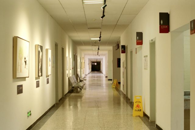 WHO report: Global nursing shortage worsened by coronavirus, six million needed A nurse in protective gear tends to a patient in a hospital bed during the coronavirus pandemic.