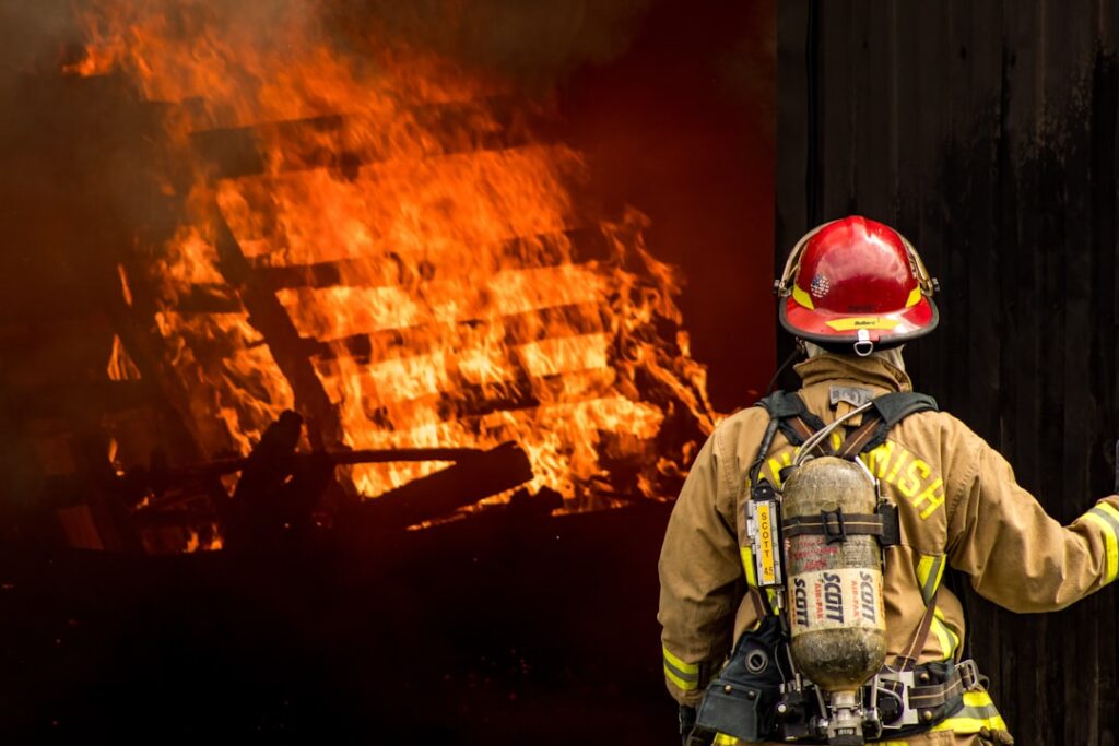 Firefighters and emergency vehicles at a damaged home in Sterling, Virginia after a deadly explosion